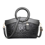 Valencia croc-embossed leather satchel with top handles and crossbody strap