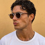 Transparent acetate sunglasses with multicolor patterned temples