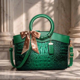 Valencia croc-embossed leather satchel with top handles and crossbody strap