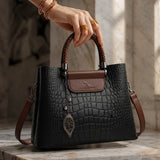Valleria croc-embossed leather satchel with braided handle