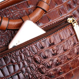 Valencia croc-embossed leather satchel with top handles and crossbody strap