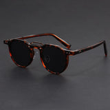 Transparent acetate sunglasses with multicolor patterned temples