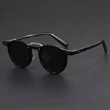 Transparent acetate sunglasses with multicolor patterned temples