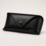 Slim vegan leather eyewear case with soft lining and snap closure