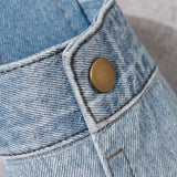 Lightweight denim slip-on mules with backless loafer design
